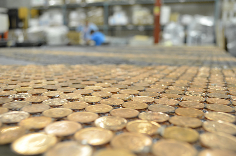 Rows of Pennies in a Packaging Warehouse